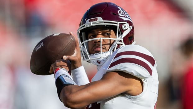Mississippi State quarterback Mike Wright warming up before game with Razorbacks